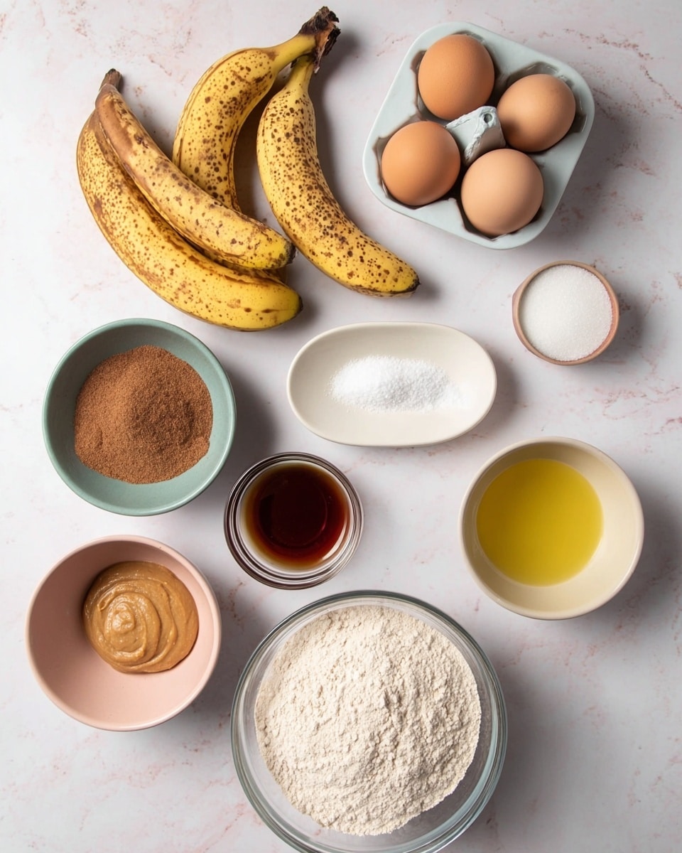 The image shows a white marbled surface with several bowls and ingredients neatly arranged for a recipe. At the top left, there are two ripe bananas with brown spots. Next to them on the right is a white egg holder with two brown eggs. Below that is a small white oval plate holding two small piles of fine white powders. To the left, there is a pale peach round bowl filled with granulated sugar, and next to it is a grayish-blue round bowl with brown sugar. Below these, a small clear glass bowl contains a smooth light brown paste. To the right, a small beige bowl has a yellow liquid. A small clear glass cup filled with dark amber liquid sits next to it. At the bottom center, a large clear round bowl is filled with white flour. Everything is placed on a clean white marbled surface. photo taken with an iphone --ar 4:5 --v 7