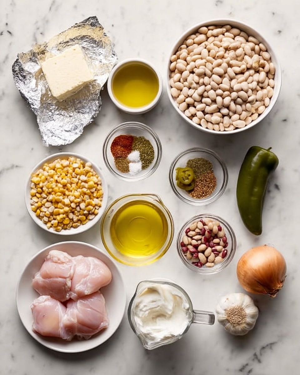 The image shows many cooking ingredients arranged on a white marbled surface. In the bottom left, there is a white bowl holding several pieces of raw chicken, pale pink in color and smooth in texture. Next to it is an open foil packet with a block of white cream cheese. In front, there is a small clear bowl with yellow olive oil and beside it a metal measuring cup filled with white sour cream. Above that, to the right, is a large white bowl full of pale beige white beans. To the left of that is a small plastic cup with light yellow corn, and nearby a plastic cup with brown pinto beans. Above the chicken, there are three small clear bowls each with different spices: one with mixed red and green dried herbs, one with a brown powdered spice, and another with a yellow-brown spice. There is also a whole brown onion, three garlic cloves, a dark green jalapeño pepper, a bowl of chopped green chilies, and a clear measuring jug with pale yellow chicken broth. All items are spread out neatly, showing different colors and textures on the white marbled surface photo taken with an iphone --ar 4:5 --v 7