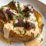 Loaded Baked Potato with Steak Bites and Parmesan Cream Sauce Recipe