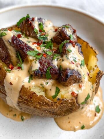 Loaded Baked Potato with Steak Bites and Parmesan Cream Sauce Recipe