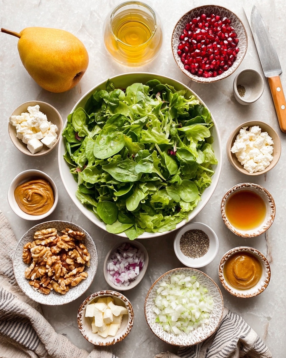 The image shows a fresh salad setup with one large white bowl in the center filled with bright green mixed leafy greens that have smooth and slightly crinkled textures. Surrounding this are several small white and patterned bowls arranged in a circle on a white marbled surface, each containing different ingredients: a bowl of pomegranate seeds with deep red glossy texture, a bowl of light brown walnuts, a bowl of crumbly white cheese, a small dish with mustard-colored paste, another small dish with a darker brown paste, a bowl with finely chopped white onions mixed with purple bits, and a small dish holding coarse salt and black pepper. On the left side, there is a half lemon with a smooth yellow skin, a whole pear with a brownish-yellow skin, a knife with a light wooden handle, and two small containers with liquids—one golden and oily, the other clear amber. A striped cloth is partly visible in the bottom corner. Photo taken with an iphone --ar 4:5 --v 7