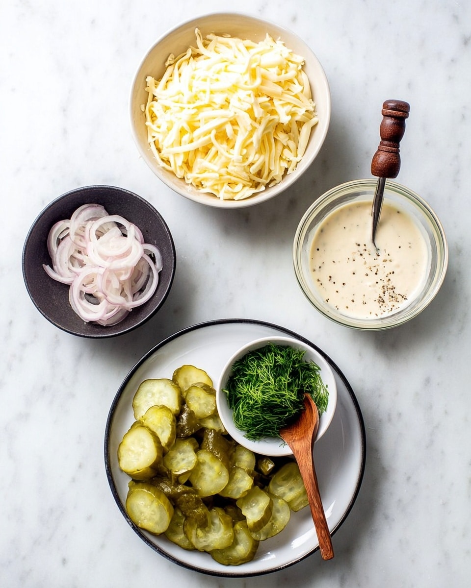 The image shows four small bowls arranged on a white marbled surface. The largest bowl is white with a black edge and holds three sections of ingredients: thinly sliced light green pickles at the bottom, finely chopped green dill in a small white bowl with a wooden spoon in the center, and thin pale pink onion rings in a small black bowl on the left. Above to the left, there is a medium white bowl filled with shredded pale yellow cheese. To the right, there is a small clear glass bowl with creamy white sauce with black pepper, and a small wooden spoon with a black handle resting inside it. photo taken with an iphone --ar 4:5 --v 7