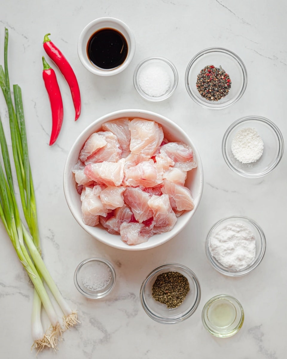 The image shows a clean white marbled surface with a white bowl at the center filled with raw light pink fish pieces. Around the bowl, there are several small clear glass bowls holding different ingredients including black pepper, white salt, and various white powders. To the left, there are fresh green onion stalks and two bright red chili peppers. There is also a small white dish containing a dark liquid near the green onions and a small clear bowl with a light liquid below it. The arrangement is neat and spaced out evenly. photo taken with an iphone --ar 4:5 --v 7