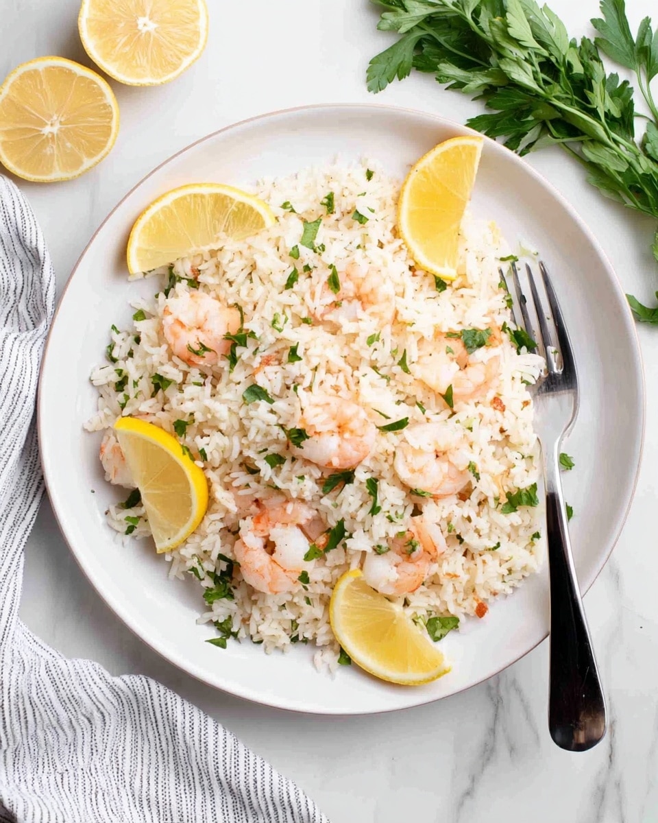 A white round plate filled with a single layer of cooked white rice mixed evenly with pink shrimp and small green parsley leaves. On top and around the rice, there are thin yellow lemon slices placed in a scattered pattern. The plate is set on a white marbled surface next to a fork with a black handle on the right side, fresh green parsley on the bottom right, and a white cloth with gray stripes on the left side. The photo is bright and clear, taken from above, showing all details well, photo taken with an iphone --ar 4:5 --v 7