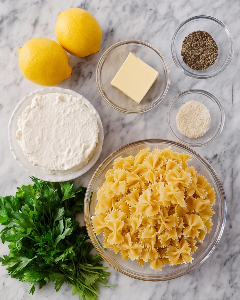 A top-down view of various cooking ingredients arranged on a white marbled surface. At center right, a large clear glass bowl filled with uncooked yellow farfalle pasta with a bow tie shape. Surrounding it clockwise are small glass bowls containing a cube of pale yellow butter, white salt, grated cheese, and crushed black pepper. At top left, two whole yellow lemons rest side by side. Below the lemons is a large white round container filled with smooth white creamy cheese. At bottom left, a bunch of fresh green parsley leaves adds a fresh touch. The ingredients are spaced evenly and neatly. Photo taken with an iphone --ar 4:5 --v 7