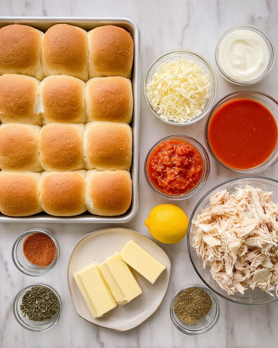 The image shows a baking tray of 12 soft, golden brown bread rolls arranged in a 3 by 4 grid on the left side, and on the right side, several small clear glass bowls filled with ingredients: one with shredded white cheese, one with plain white cream, one with bright red tomato sauce, and one with shredded cooked chicken meat. There are two small glass bowls of dried green herbs and spices, a small bowl containing powdered spices in red and beige colors, a small off-white oval plate with six slices of pale yellow butter, and one whole yellow lemon placed on a white marbled surface photo taken with an iphone --ar 4:5 --v 7