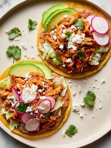 Chicken Tinga Tostada Recipe with Mexican Rice and Fresh Garnishes Recipe