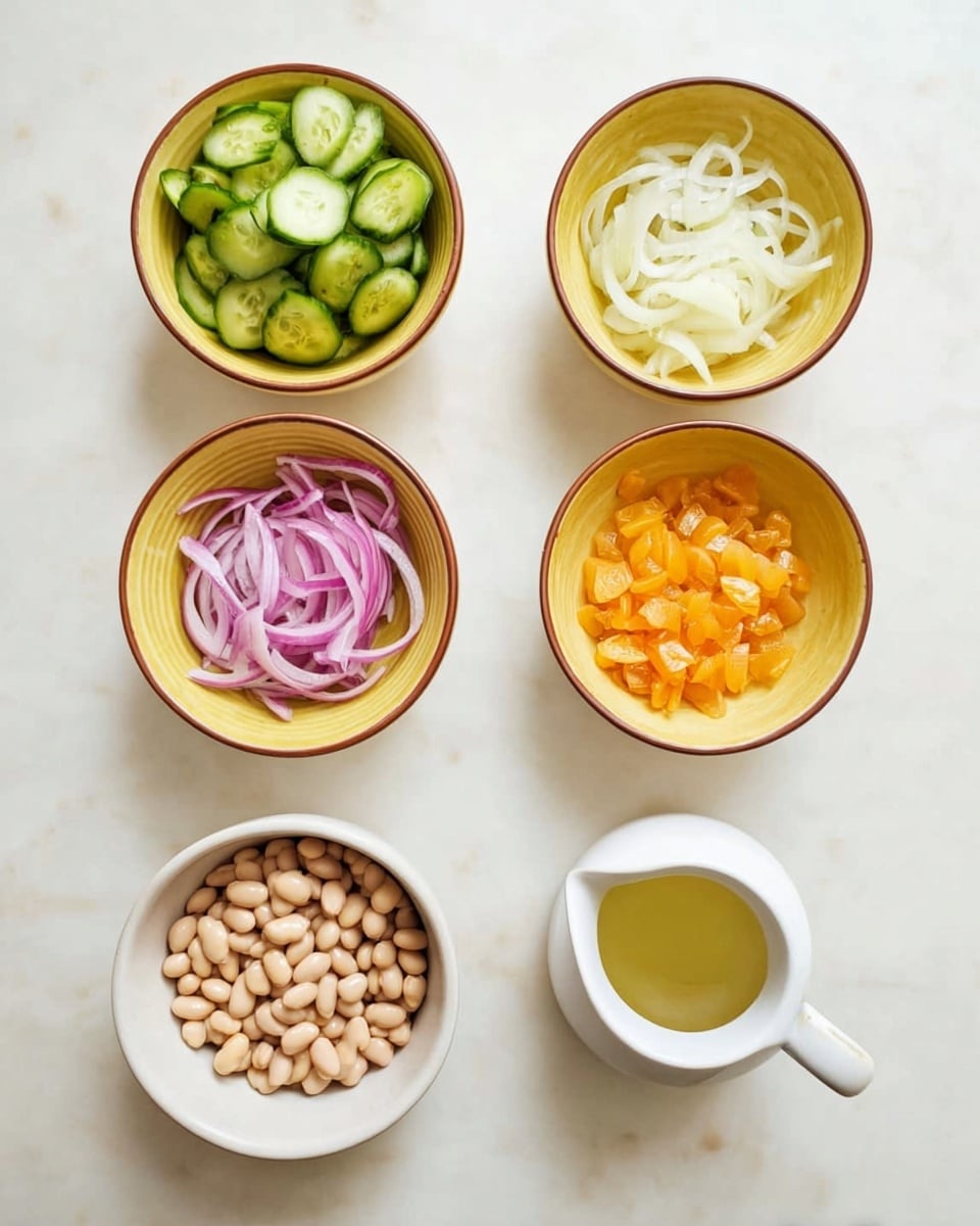 The image shows five small bowls on a white marbled surface. Four round yellow bowls with a brown rim are arranged in two rows at the top; the top left bowl holds green cucumber slices, the top right bowl contains white onion slices, the bottom left bowl has thin purple onion slices, and the bottom right bowl is filled with small orange pieces. Below these, there is a white bowl filled with light beige beans and a small white jug containing a small amount of light yellow liquid. The bowls and jug are spaced evenly in a neat and clean arrangement. Photo taken with an iphone --ar 4:5 --v 7