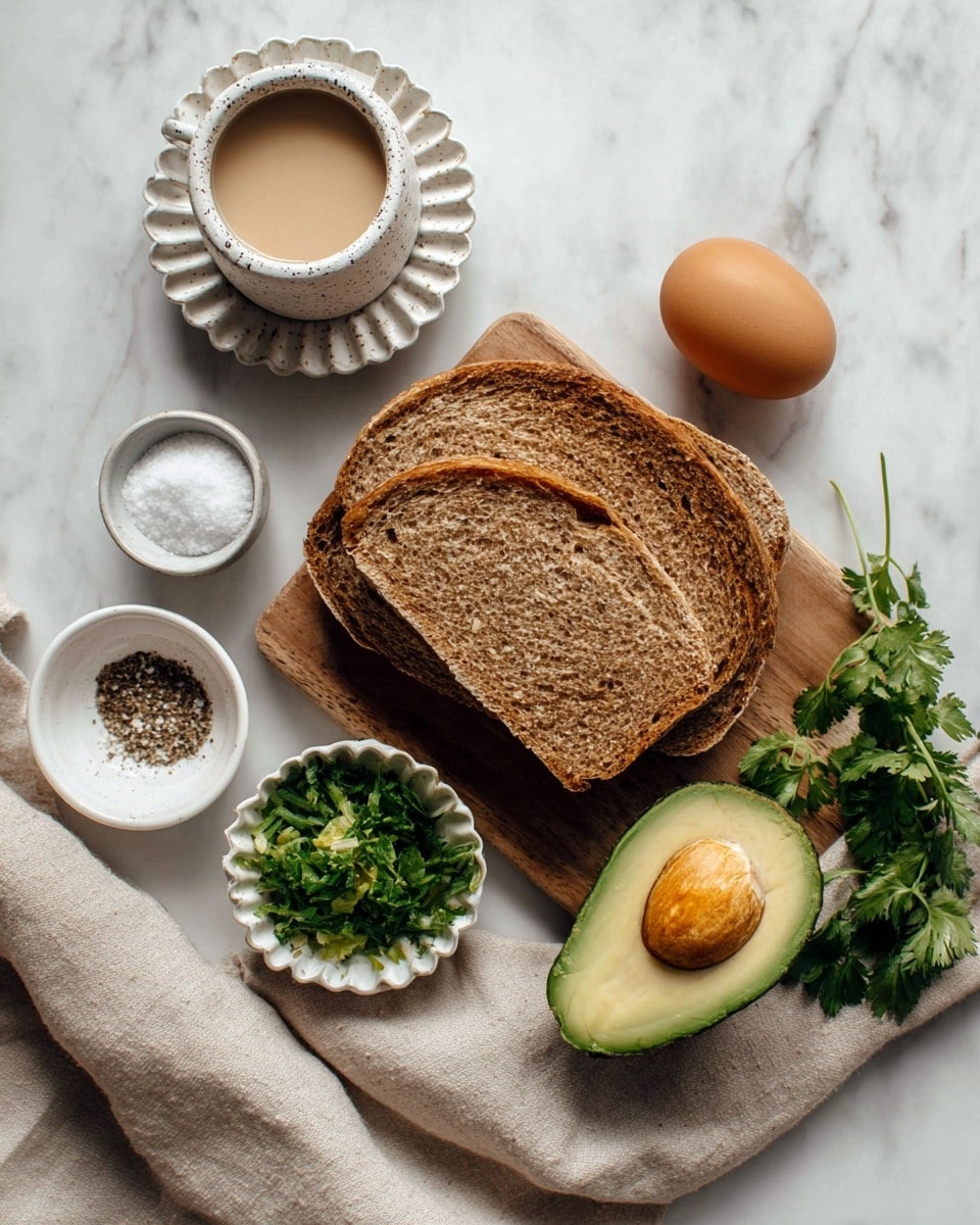 Two thick slices of brown bread with a rough texture rest on a wooden board. To the right of the bread is a halved avocado showing green flesh and a large brown seed. Next to the board are two brown eggs with a smooth surface. Above the bread on the board is a small white speckled cup with a beige liquid inside, sitting on a white scalloped saucer. Below the board is a small white bowl holding fresh green herbs, likely parsley, with some sprigs spilling over. Beside the herb bowl is a small white dish with salt and black pepper. A beige cloth is casually placed around the board, all set on a white marbled surface. photo taken with an iphone --ar 4:5 --v 7