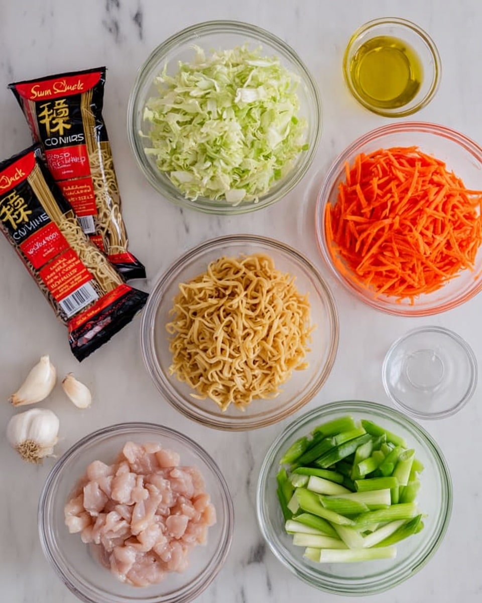 The image shows six clear glass bowls arranged on a white marbled surface, each filled with different ingredients. One bowl holds finely chopped light green cabbage, another has bright orange shredded carrots, and a third contains evenly sliced green spring onions. There is a bowl with small pieces of raw pale pink chicken placed near the center. Two cloves of garlic and a small glass container of clear cooking oil are also on the surface. Behind the bowls, two packets of Sun Luck chow mein noodles with red and black packaging lean upright. The colors vary from light green and orange to pale pink and clear, and the textures range from soft chicken to crunchy vegetables and dry noodles. photo taken with an iphone --ar 4:5 --v 7