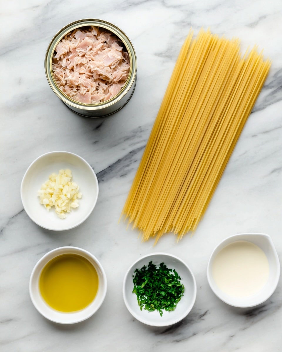 The image shows ingredients laid out on a white marbled surface, arranged neatly in two rows. On the right side, there is a bundle of uncooked spaghetti, long and straight with a pale yellow color. On the left side, there is an open can filled with light pinkish pieces of tuna at the top. Below it, there are five small white bowls: one holds minced garlic with a creamy white color, another contains golden yellow olive oil, the third holds a small amount of white liquid, possibly cream, and the last has finely chopped green herbs, likely parsley. The arrangement is clean and organized with clear color contrasts between the yellow, green, white, and pinkish tones. Photo taken with an iphone --ar 4:5 --v 7